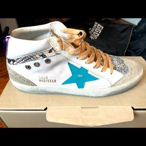 New- never worn - Golden Goose mid star sneakers